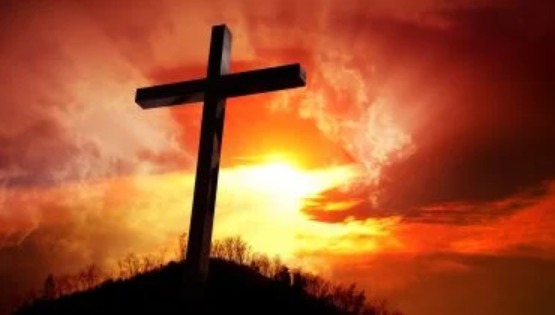 God's Sovereignty - Cross against golden sunset