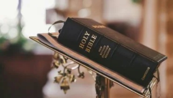 Inspired Scripture - Holy Bible on stand