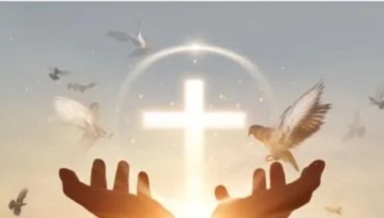 The Holy Spirit in Believers - Hands towards cross